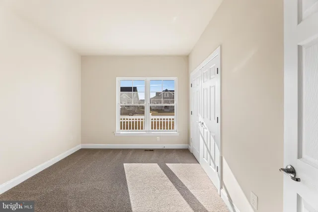 a view of a room with a large window