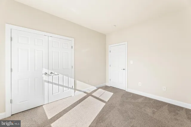 a view of a livingroom with wooden floor