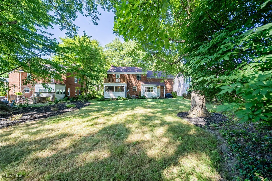 3684 Fenley Road Cleveland Heights, OH 44121 - Photo 35 of 38 View of green lawn featuring a sunroom