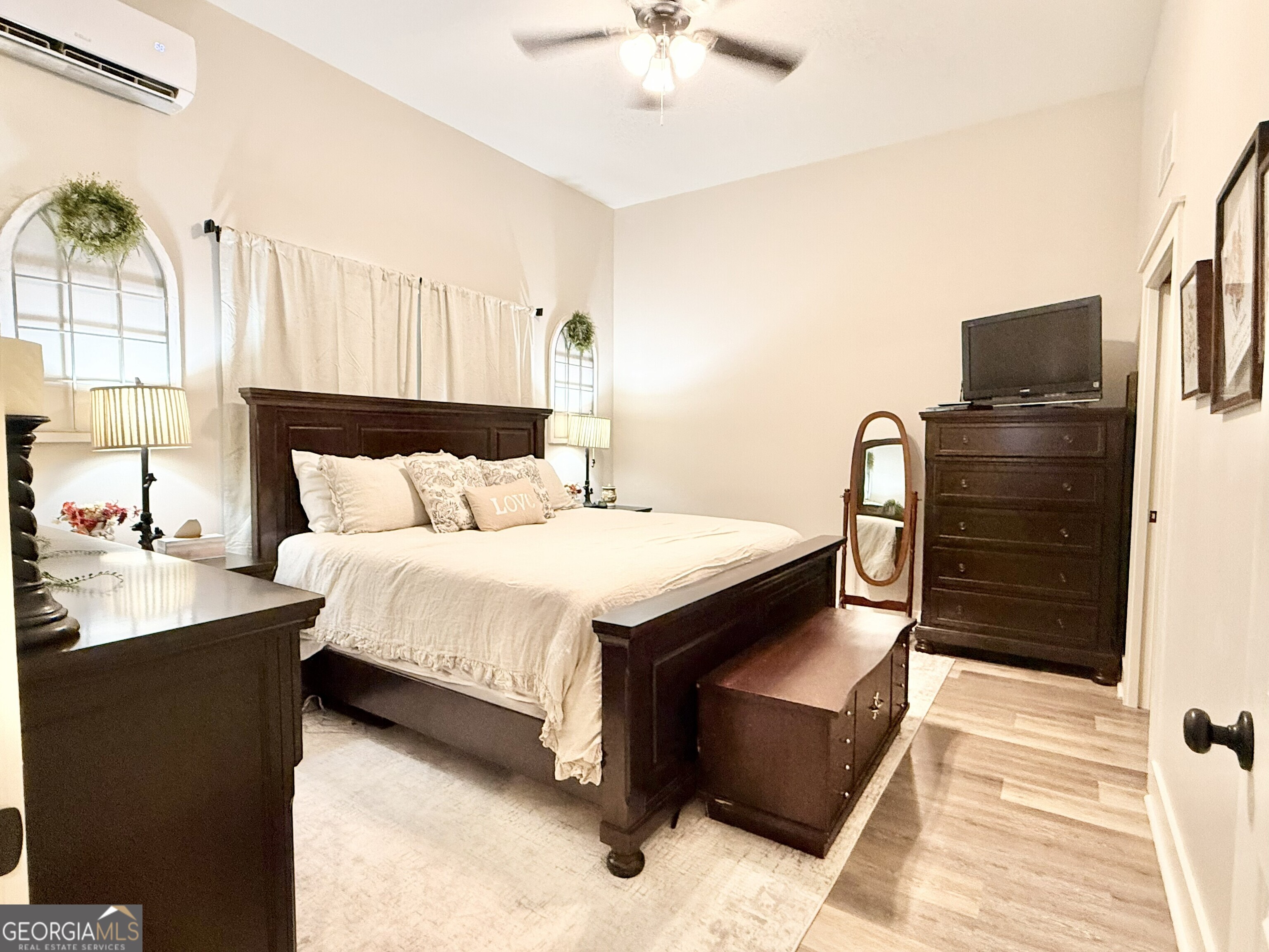 919 West Milner Road Concord, GA 30206 - Photo 36 of 40 a bedroom with a bed and a television