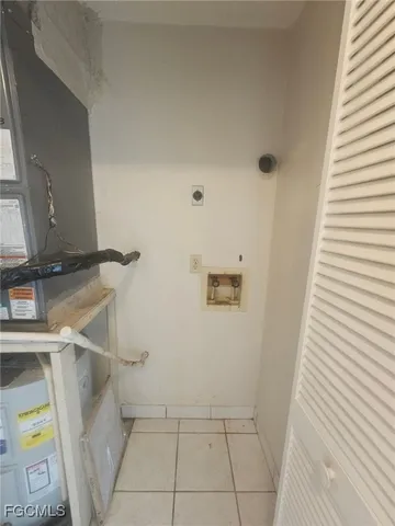 a swimming pool with lawn chairs