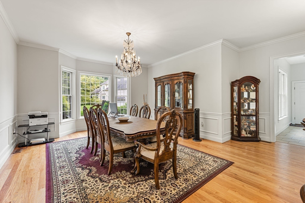 6 Ashley Court Lynnfield, MA 01940 - Photo 12 of 41 a view of a dining room with furniture and wooden floor