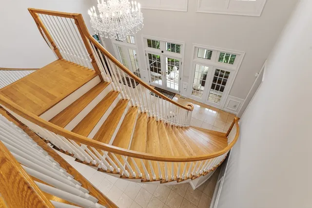 a view of staircase with large window