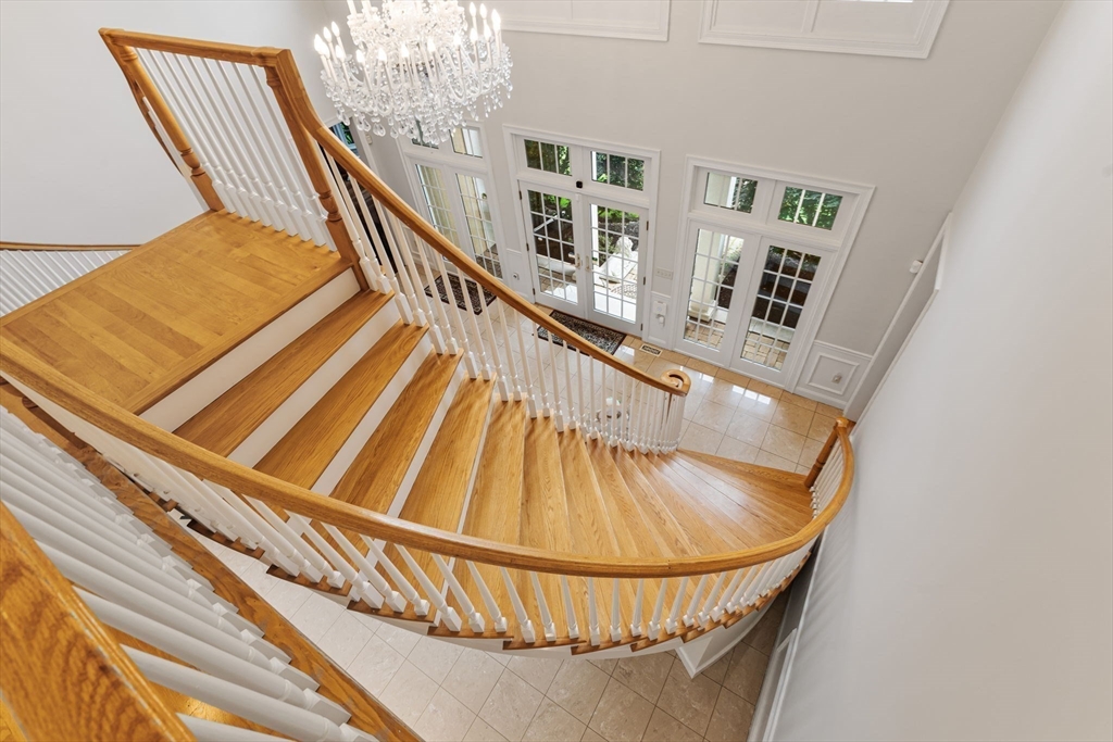 6 Ashley Court Lynnfield, MA 01940 - Photo 15 of 41 a view of staircase with large window