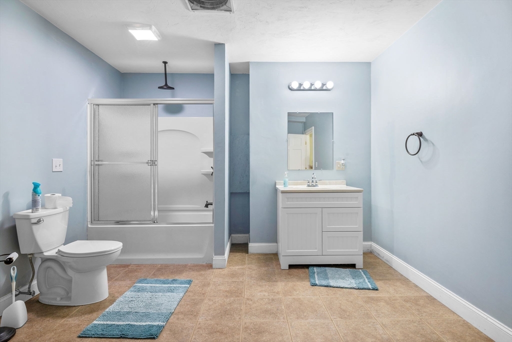 6 Ashley Court Lynnfield, MA 01940 - Photo 34 of 41 a bathroom with a sink a toilet and shower