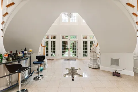 a view of a living room and dining room