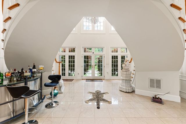 a view of a living room and dining room