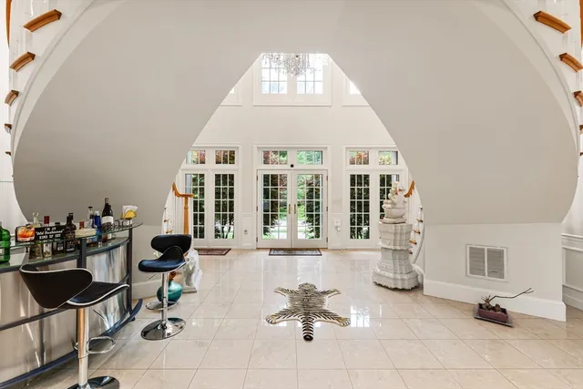 a view of a living room and dining room