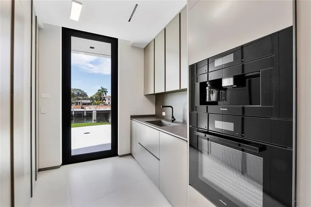 a view of a lake with couches and city view