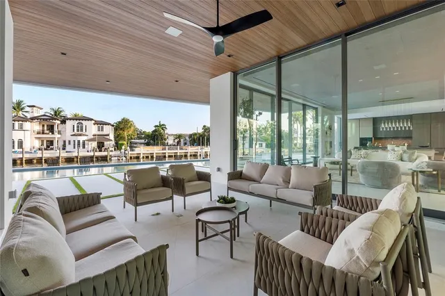 a bedroom with furniture and a flat screen tv