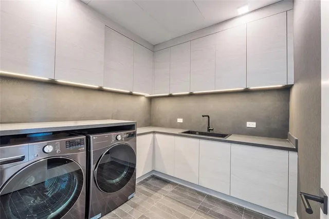 a spacious bedroom with a large bed and a flat screen tv