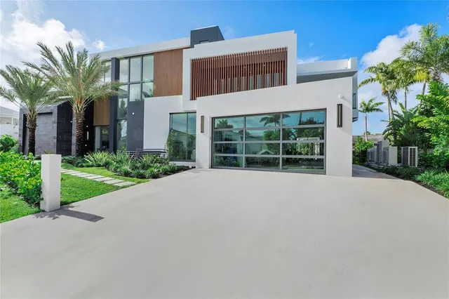 a view of a room with balcony and wooden floor