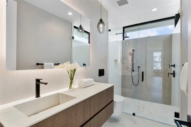 a view of swimming pool with outdoor seating and city view