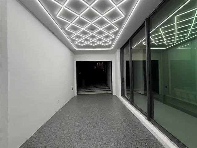 a kitchen with a table and chairs in it