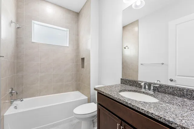 a utility room with washer and dryer