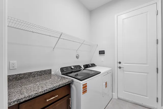 a view of a house with a big yard