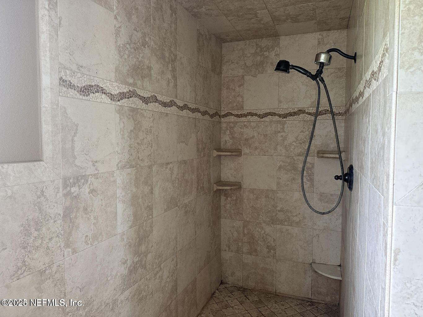 9465 Cowpen Branch Road, Unit A Hastings, FL 32145 - Photo 18 of 21 a bathroom with a shower