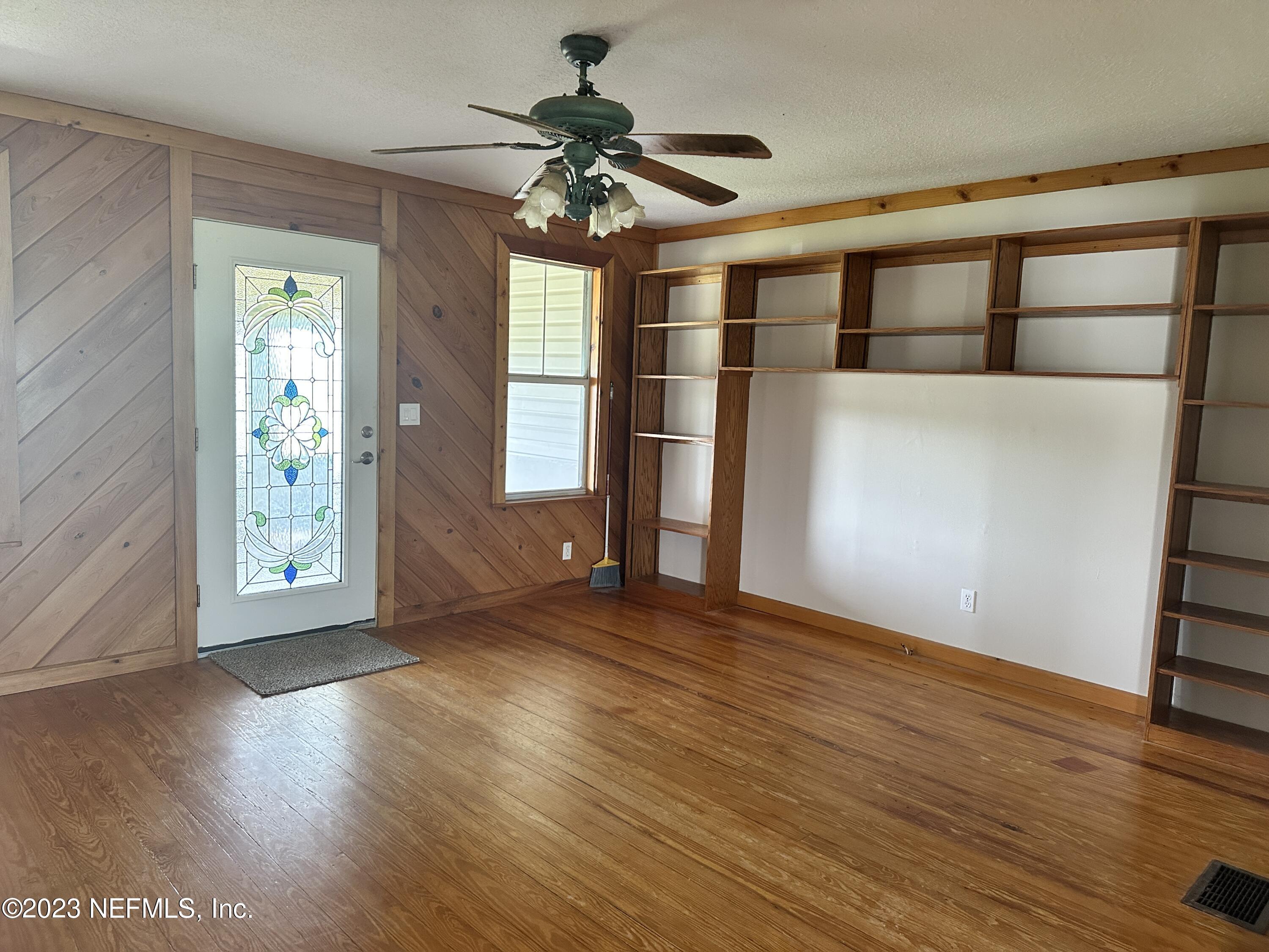 9465 Cowpen Branch Road, Unit A Hastings, FL 32145 - Photo 9 of 21 a view of entryway with wooden floor