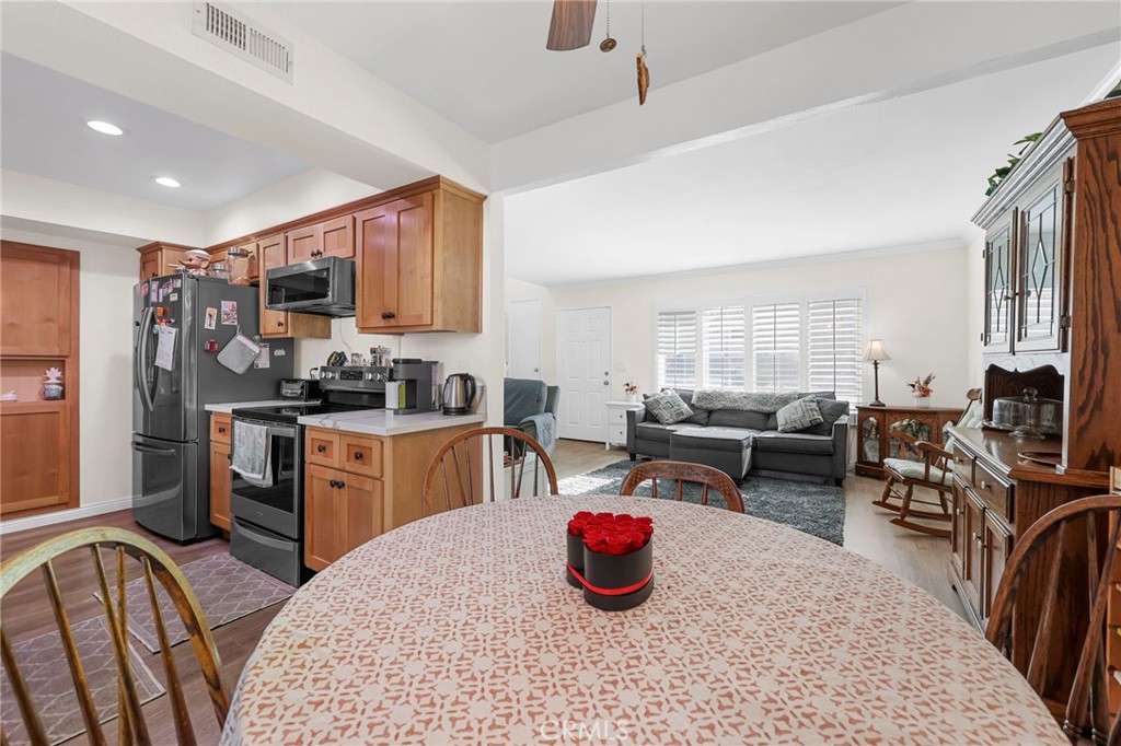 360 Meadow Court Brea, CA 92821 - Photo 10 of 33 View of living room and kitchen from dining area