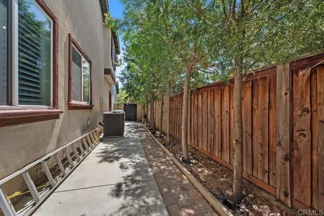 a house with trees in front of it