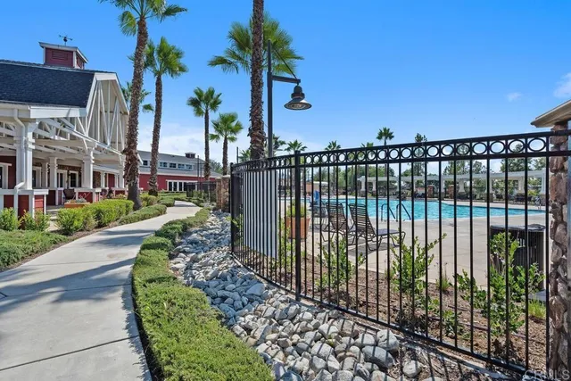 a view of a wrought iron fences in front of house