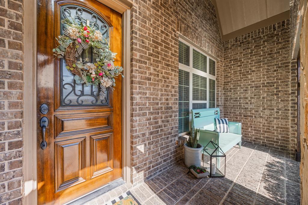 1206 Wedgewood Drive Forney, TX 75126 - Photo 7 of 40 a view of a door of the house with a outdoor space