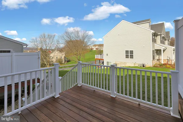 a view of a wooden roof deck