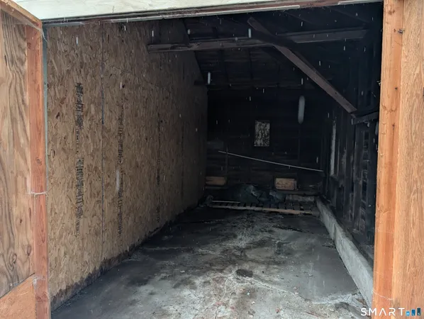 a view of house with backyard