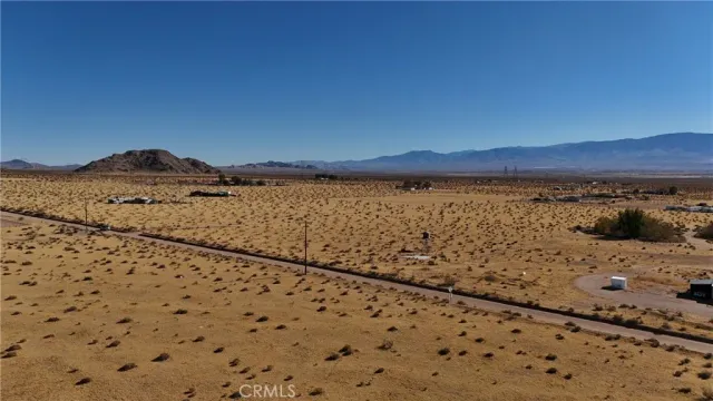 a view of lake with mountain