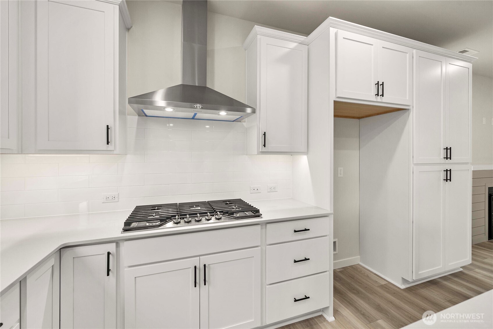 32329 Bryant Road Sultan, WA 98294 - Photo 16 of 38 a kitchen with stainless steel appliances white cabinets and a stove