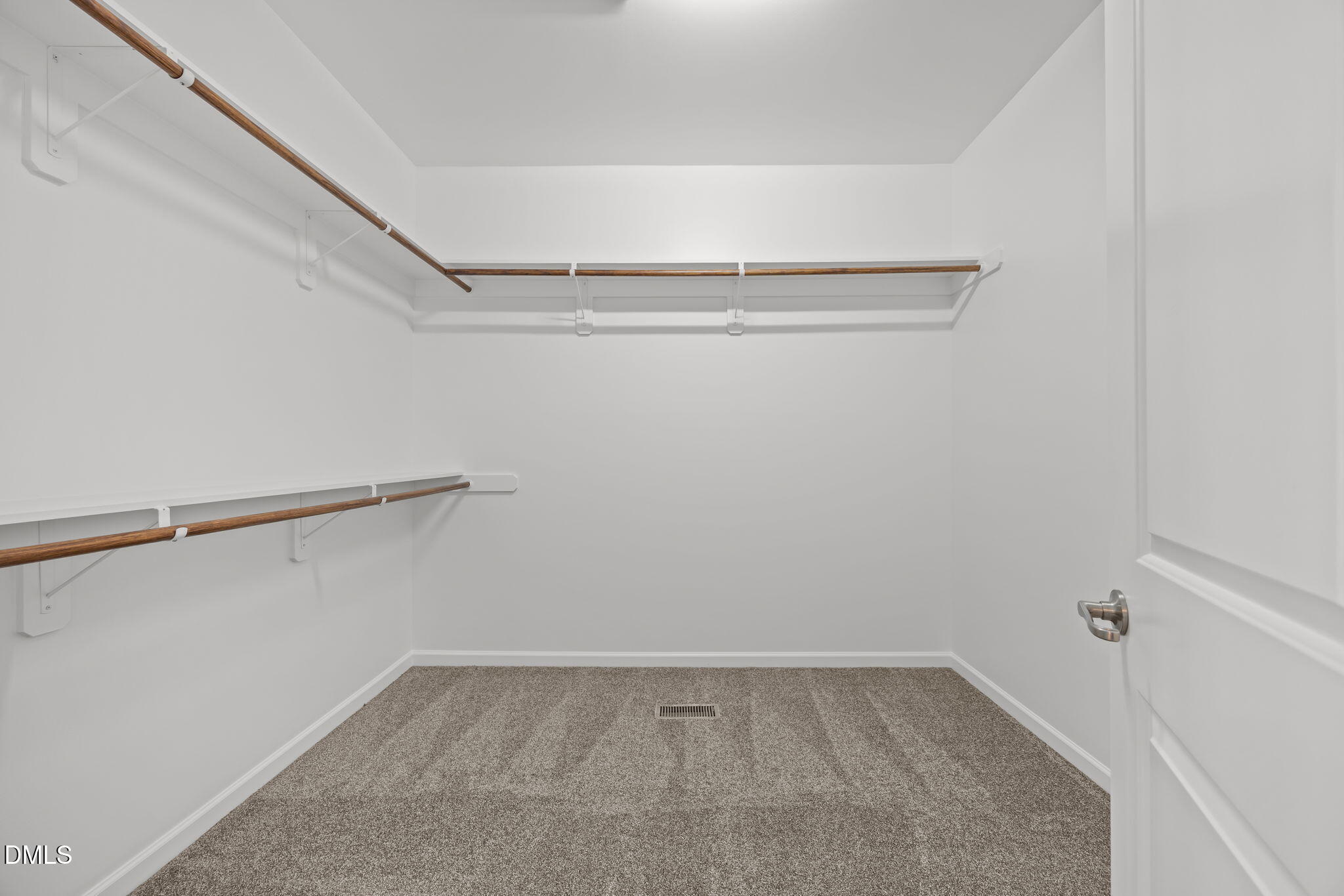1319 Rodessa Run Raleigh, NC 27607 - Photo 26 of 64 a view of an empty walk in closet