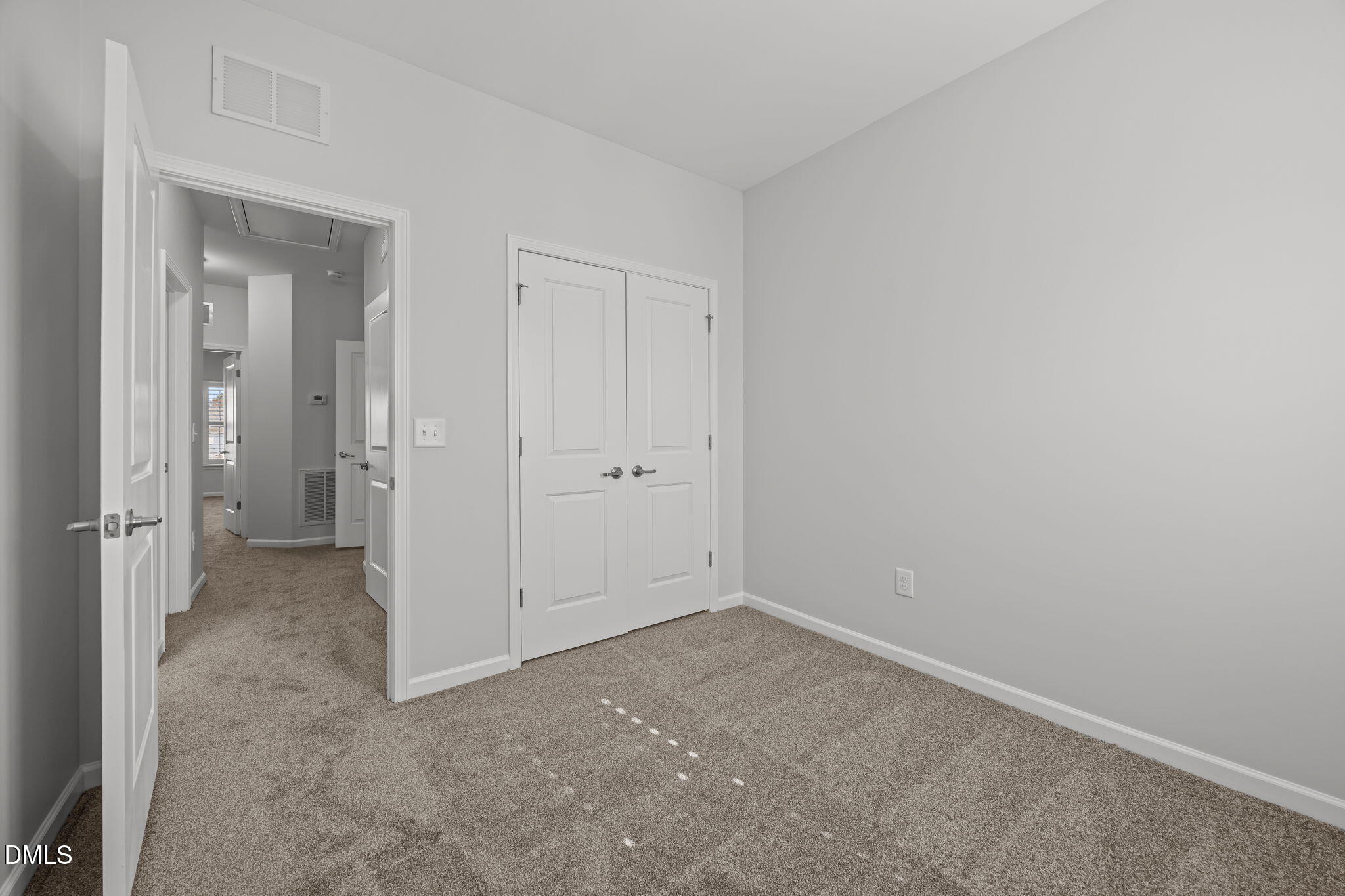 1319 Rodessa Run Raleigh, NC 27607 - Photo 36 of 64 wooden floor and cabinet in an empty room
