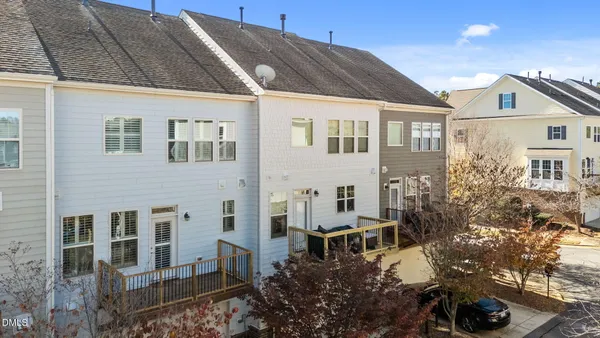a view of residential houses with outdoor space