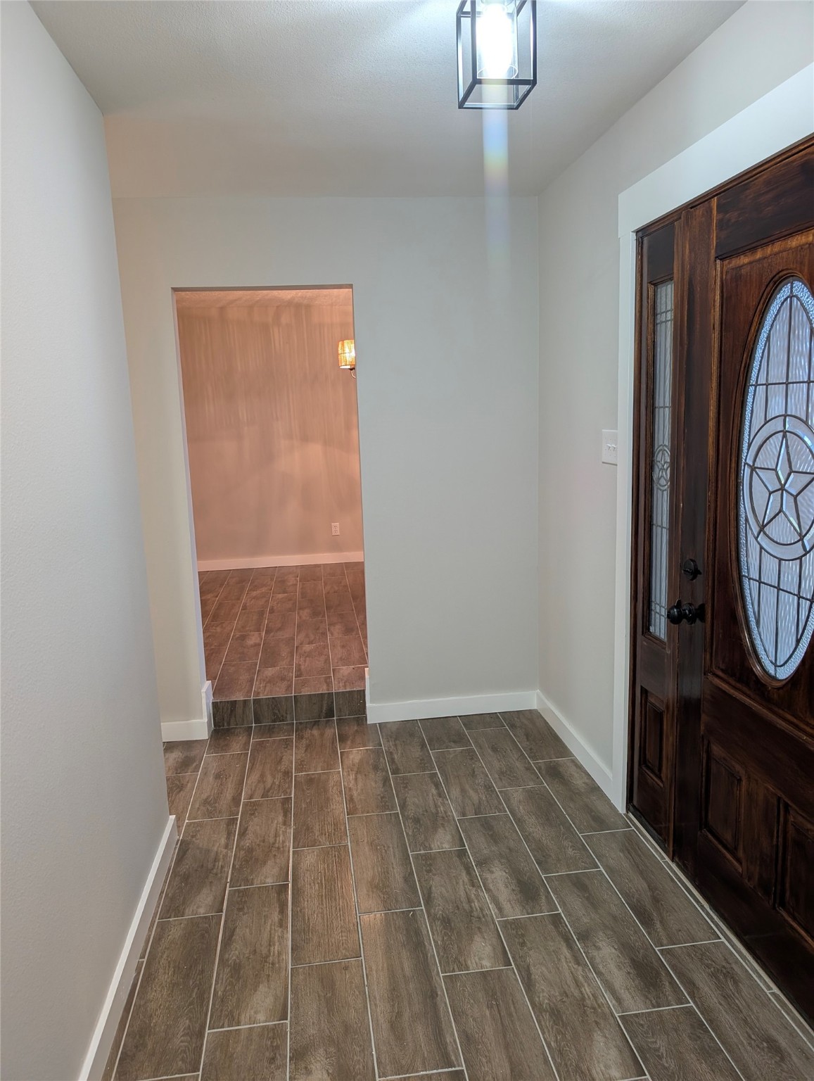 1145 Cuniff Road Sour Lake, TX 77659 - Photo 14 of 22 Foyer area opens up to an extra room or office