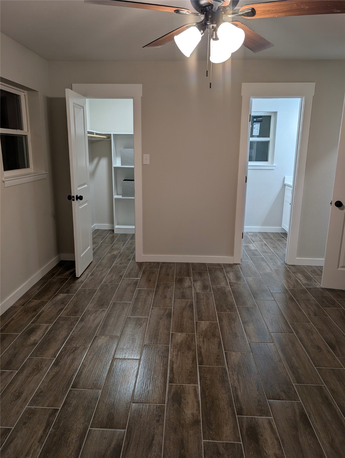 1145 Cuniff Road Sour Lake, TX 77659 - Photo 17 of 22 wooden floor in an empty room with a mirror