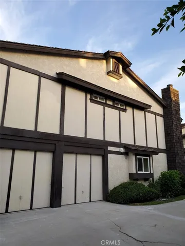 a front view of a building with large windows