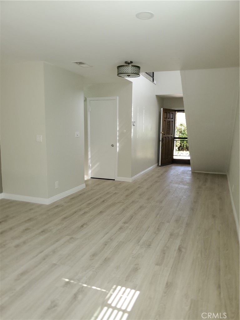 423 East Duarte Road, Unit A Arcadia, CA 91006 - Photo 4 of 11 wooden floor in an empty room