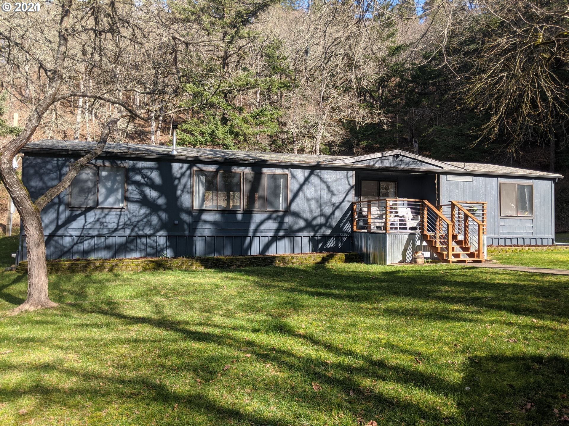 565 Eastside Road Hood River, OR 97031 - Photo 1 of 28 a view of a swimming pool with a yard