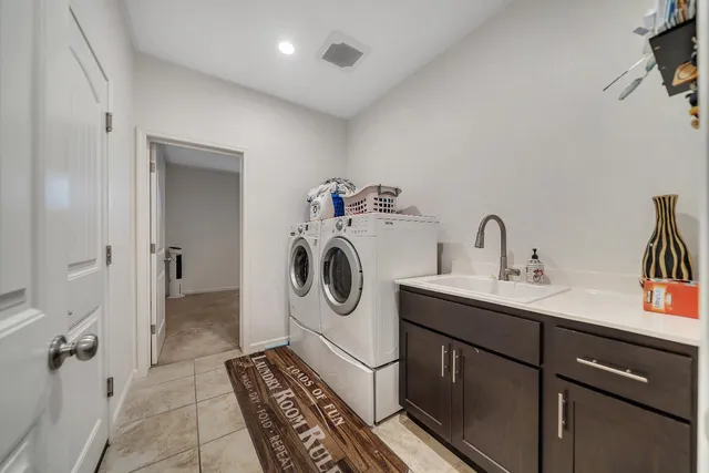 a bedroom with furniture and windows