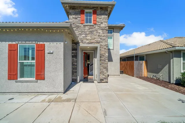 a view of house with an outdoor space