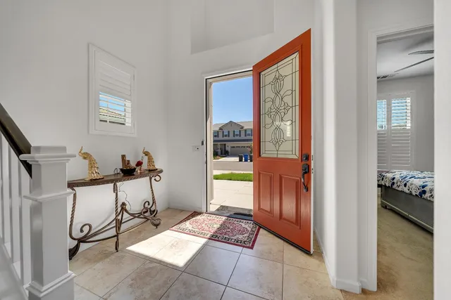 a room with furniture and a window