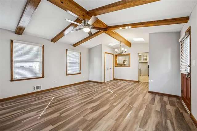 a view of an empty room and window