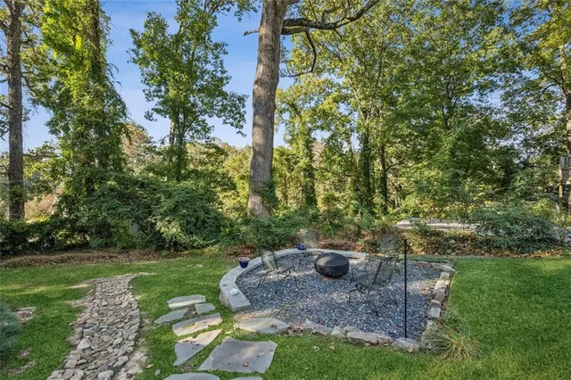 a view of a backyard with of trees