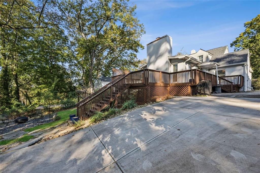 2050 Mercer Avenue Atlanta, GA 30337 - Photo 29 of 29 a front view of a house with a yard and garage
