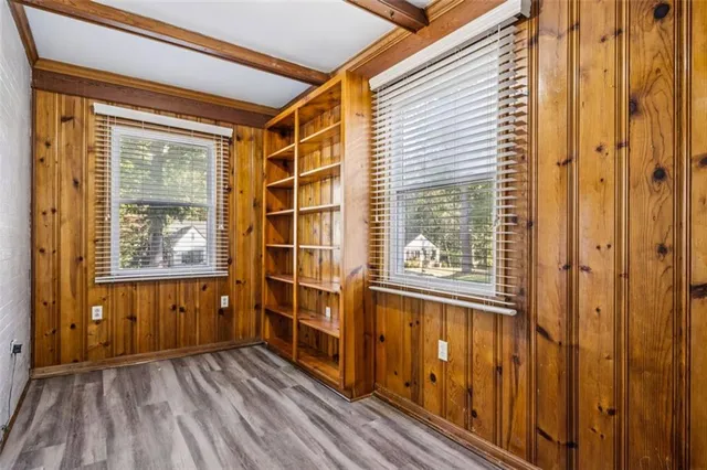 a view of front door with wooden floor