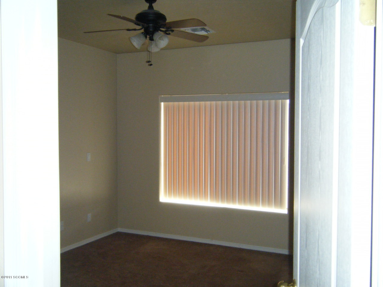 1651 Vereda Neblina Rio Rico, AZ 85648 - Photo 10 of 15 a view of an empty room with a window