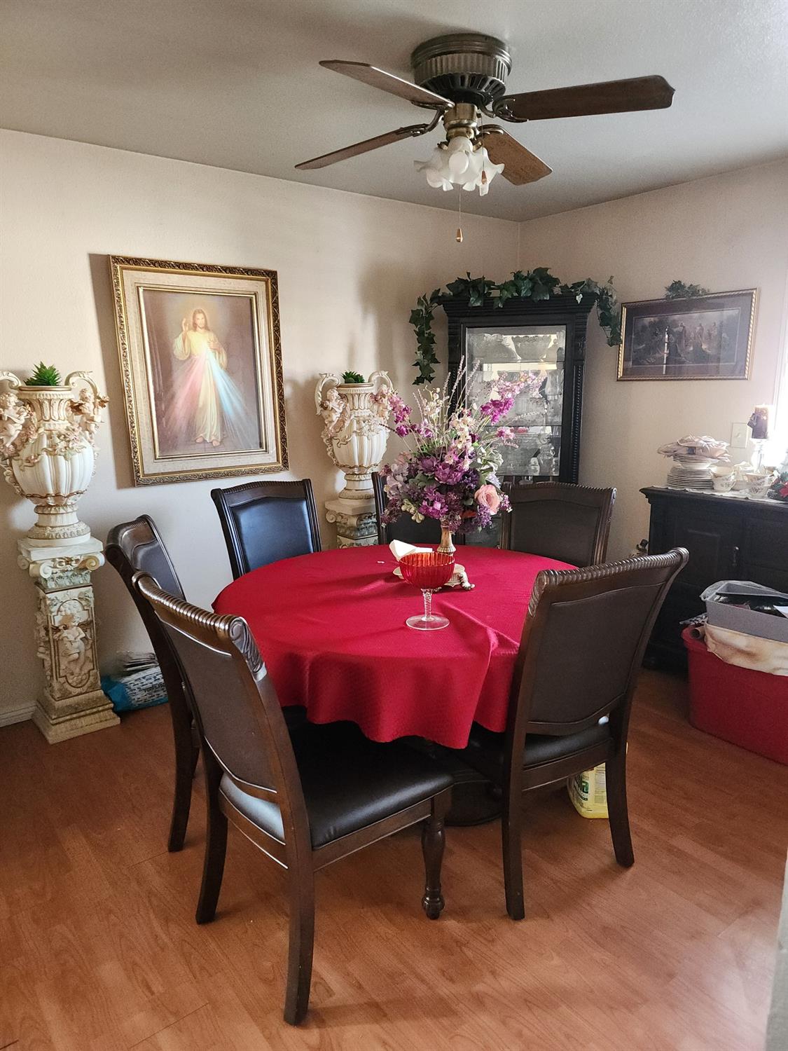 1406 Quail Street Los Banos, CA 93635 - Photo 5 of 18 a view of a dining room with furniture
