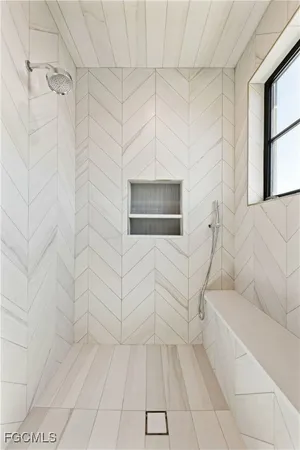 a bathroom with a sink and mirror