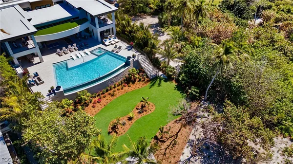 an aerial view of a backyard