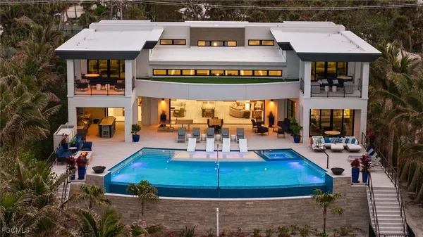 a view of a cafe with sitting area